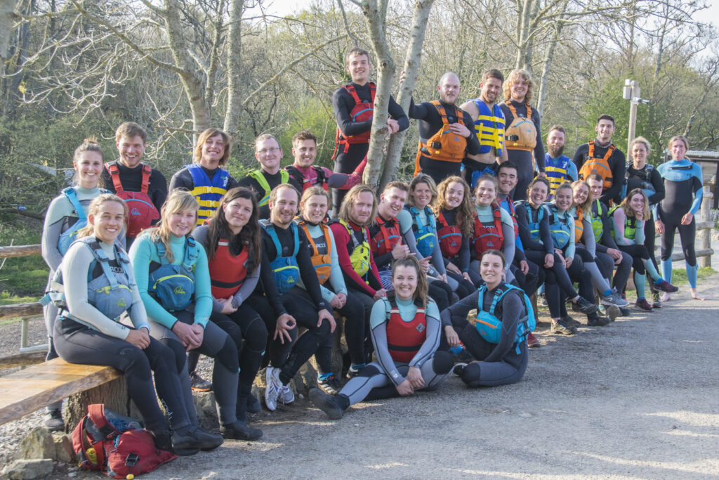 Large group shot of outdoor instructors to illustrate the marketing intern opportunities at Land and Wave