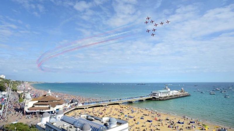 Bournemouth Air Festival during Bank Holiday with the Red Arrows over Bournemouth Pier