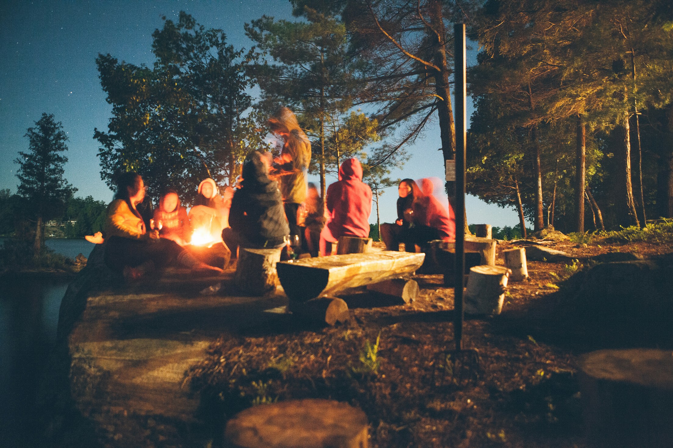 Group around a Camp fire bushcraft